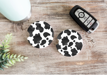 Load image into Gallery viewer, Cow Print Car Cup Holder Coasters
